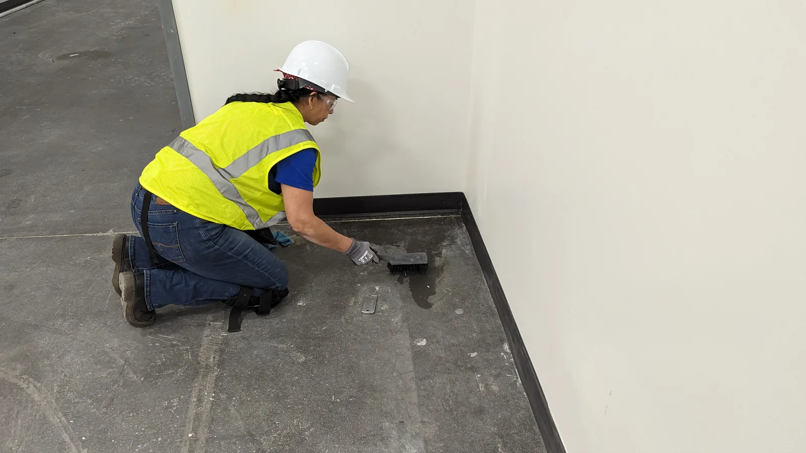 LeBlanc Cleaning crew performing detailed baseboard scrubbing in a commercial space in the East Valley