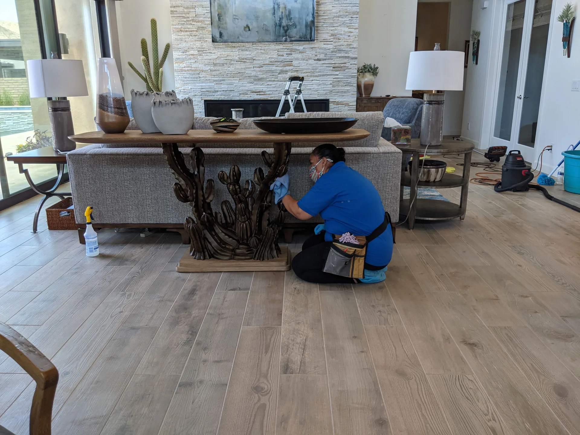 LeBlanc Cleaning technician detailing baseboards and surfaces during a deep cleaning service