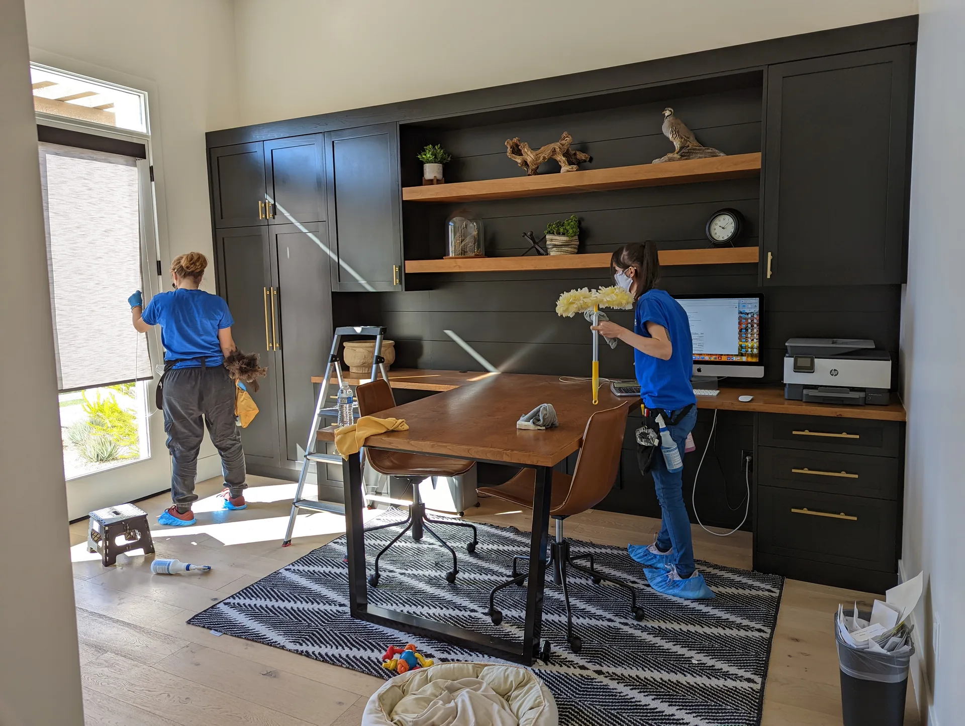 Professional team cleaning an empty home interior for move-in or move-out service in the East Valley